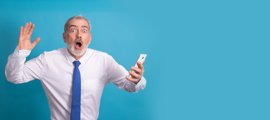 amazed isolated business adult man looking at mobile phone