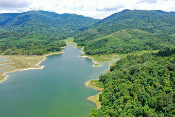 Obraz na płótnie Canvas Beautiful Lake dam water reservoir And green forest Aerial view From Thailand