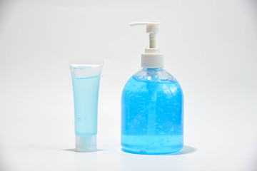 Blue colour sanitizer portable type with bottled alcohol gel  for disinfecting the hands and face mask to prevent the inflection of epidemic Covid 19 isolated on white background