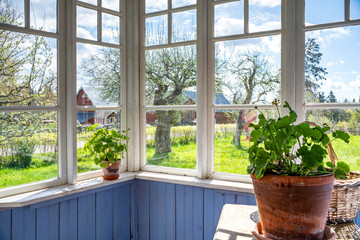 Porch interior by the Buildings entrance in Swedish rural cottage on a sunny day in Smaland, Sweden.