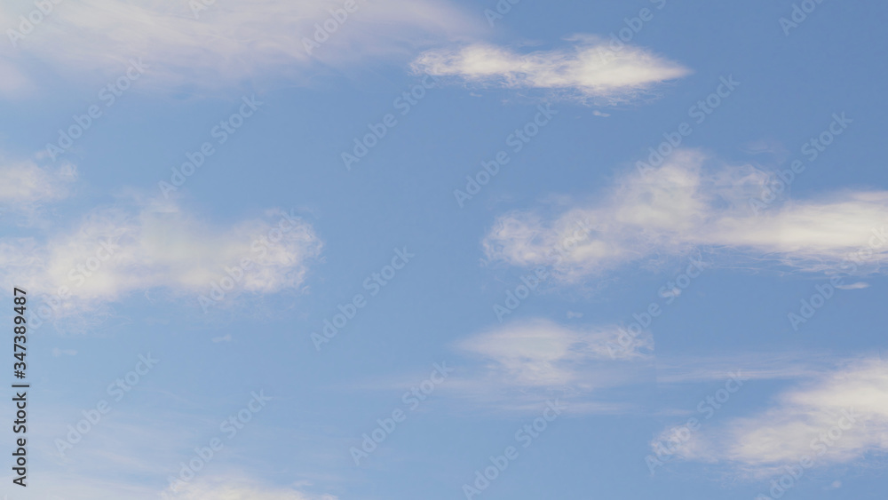 Wall mural cloudy white clouds and blue sky background. shinny clear sky day with sun shine. beautiful skyscape