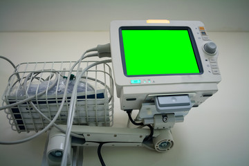 Medical monitor inside patient hospital room