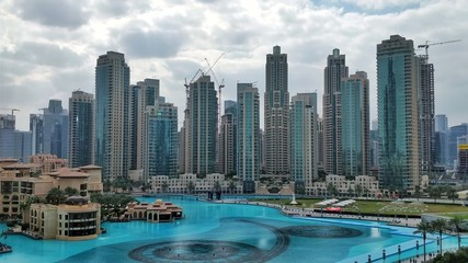 Fototapeta na wymiar Dubai- UAE, United Arab Emirates, Skyscrapers and buildings in downtown city with the wolrd's largest water dancing fountain,captured on 1-4-2018