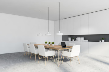 White and gray kitchen corner with table
