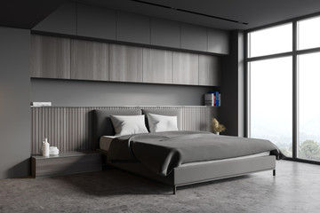 Gray and wooden master bedroom corner