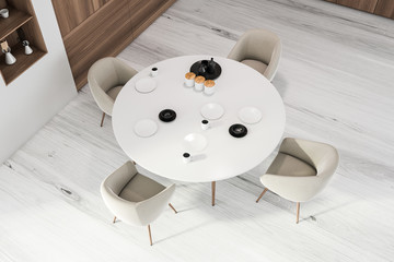 White and wooden dining room, top view