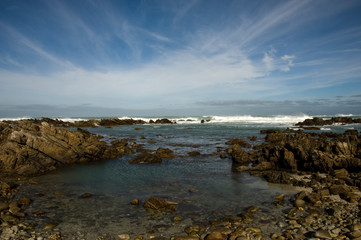 Fototapeta na wymiar beach and rocks with wonderful sky cape agulhas