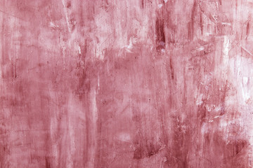 Red concrete background, wall with texture, preparation for design. Copy space.