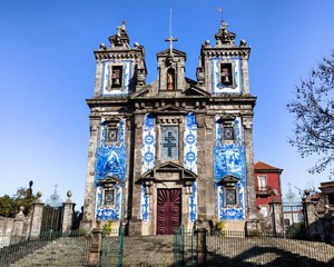 Fototapeta na wymiar Facade of St Ildefonso Church in Porto, Portugal