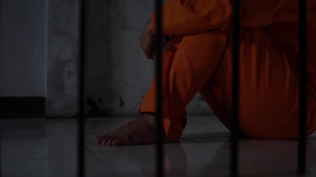 Asian woman desperate at the iron prison,prisoner concept,thailand people,Hope to be free,Serious prisoners imprisoned in the prison