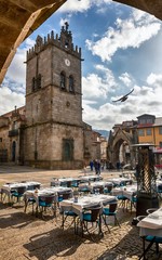 A scenic cityscape of Guimarães, Portugal, at the Largo da Oliveira city square