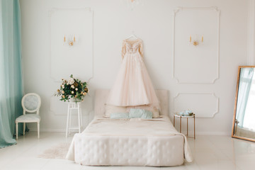wedding dress in a bedroom