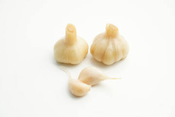 Sugar garlic on the white table.