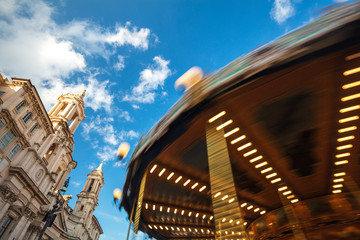 Ancient German Horse Carousel built in 1896 in Navona Square, Rome, Italy