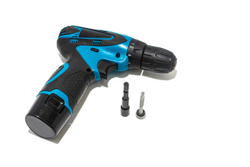 Screws and drill isolated on a white background, tapping screws made od steel.