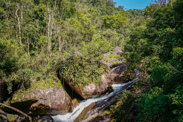 Fototapeta na wymiar Water cascades in tropical Atlantic forest, Serra da Mantiqueira, Brazil 