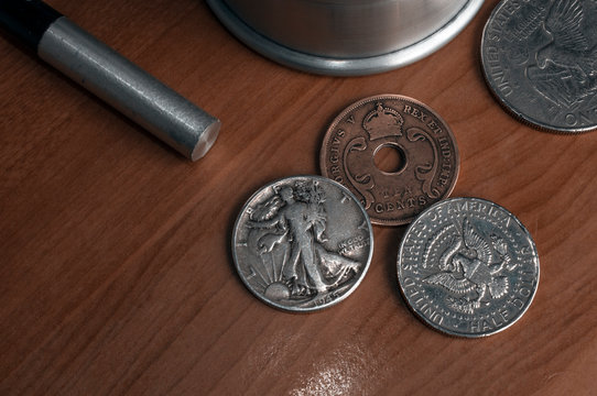 Set Of Old Coins To Perform Coin Magic Including A Walking Libery And An Eagle Half Dollar And A East Africa Ten Cents Coin