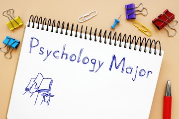 Psychology Major phrase on the piece of paper.