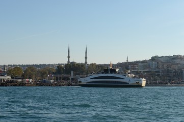 Fototapeta premium Passenger ships in the Bosphorus Strait at the Uksyudar Shehir Khatlary Isklesi Maritime Station on the Asian side of Istanbul