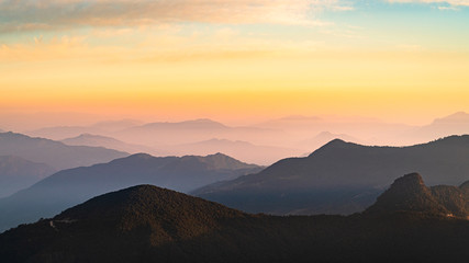 Layers of foggy hills and mountains