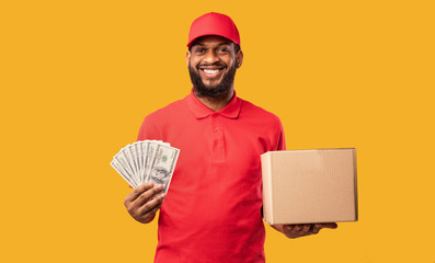 Courier Guy Holding Money Cash And Cardboard Box, Studio Shot