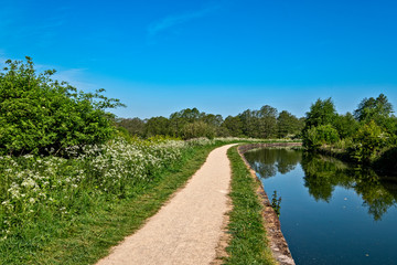 Fototapeta na wymiar Restored towpath with Trent and Mersey canal in Cheshire UK