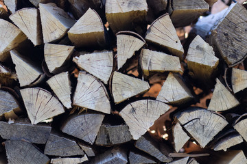 Fototapeta premium A pile of firewood for heating in winter in rural areas