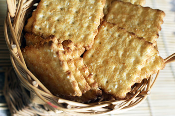 Time to drink tea and coffee break. A lot of square cookies with sesame seeds.
