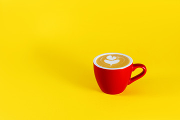 image of coffee cup on yellow background. Copy space