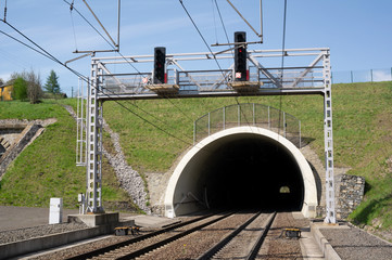 Railway and railroad track is goint into dark and long tunnel. Infrastructure building and...