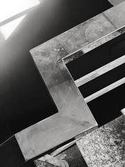 grunge metal background Building stairs grill black and white picture 