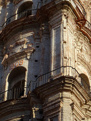 Detail of Baroque bell tower of the Church of San Juan Bautista in the old city center of Malaga....