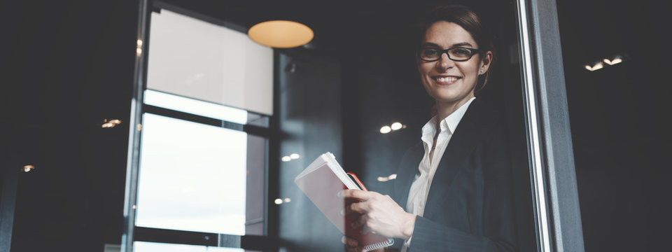 Portrait Of Charming Business Lady In Big Open Space Office. Wide Screen, Panoramic