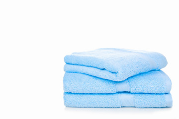 Blue towel isolated on white background with copy space