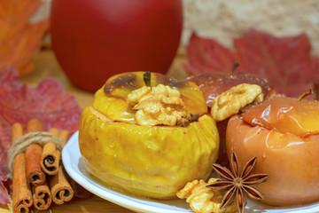 Tasty baked homemade apples, close up. Delicious healthy autumn dessert.