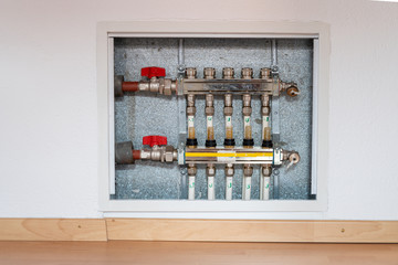 close up view of calculating controls for underfloor heating system