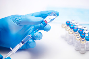 Fototapeta premium Close up on vaccine and medical syringe