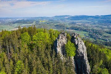 Rudawy Janowickie Landscape Park Aerial View. Rocks Sokoliki, climbing area in mountain range in Sudetes in Poland view with green forests and landscape. - obrazy, fototapety, plakaty