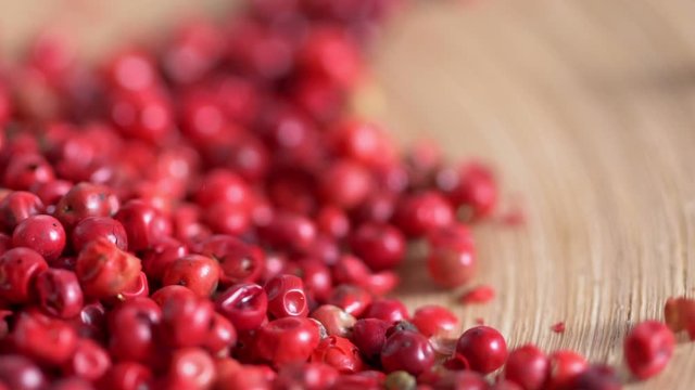Food spices pink peppercorns red pepper Himalayan pepper berries. concept of fresh and dietary spices for cooking schools vegans and dietary products