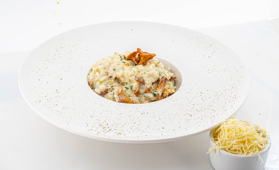 risotto with chanterelles and parmesan © mirsky337