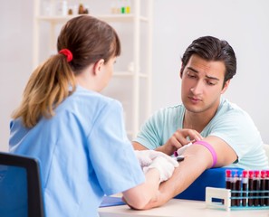 Fototapeta premium Young patient during blood test sampling procedure
