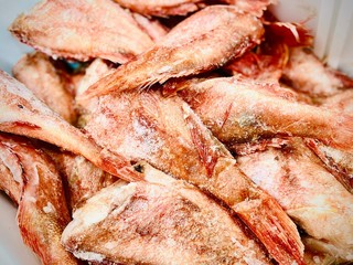 Fish and seafood in a supermarket. Close-up. Mobile photo.