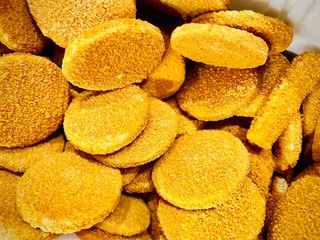 Cutlets and fish breaded. Semi-finished products. Mobile photo.