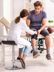 Handsome american footbal player visiting female doctor traumato