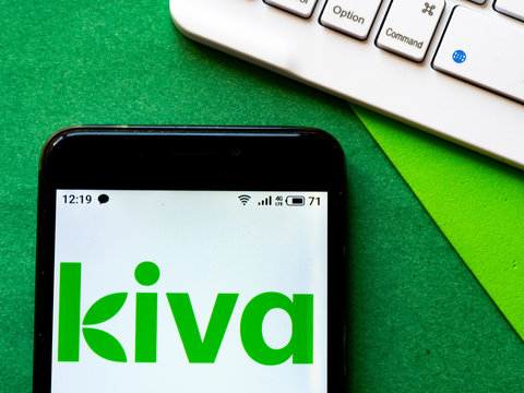  In this photo illustration Kiva Microfunds  logo is seen displayed on a smartphone
