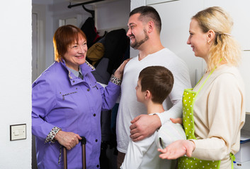 Fototapeta premium Senior woman visiting family of her son at home