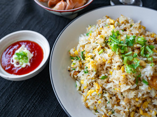 Egg Fried Rice Golden yellow
Soft, fragrant rice, sprinkled with spring onion, coriander on a white bowl,With Chicken Sausage
fried,With tomato sauce, cut in sour taste,Orange juice on glass