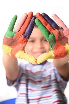 Young Indian Boy showing his painted hands