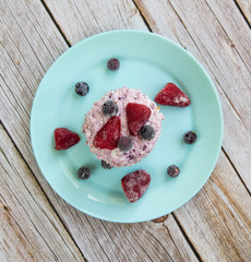 Carrot cake with curd cream and black currant