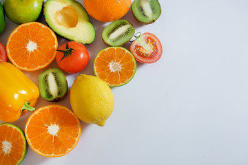 Banner from various vegetables and fruits isolated on white background, top view, creative flat layout. Concept of healthy eating, food background. Frame of vegetables with space for text.
